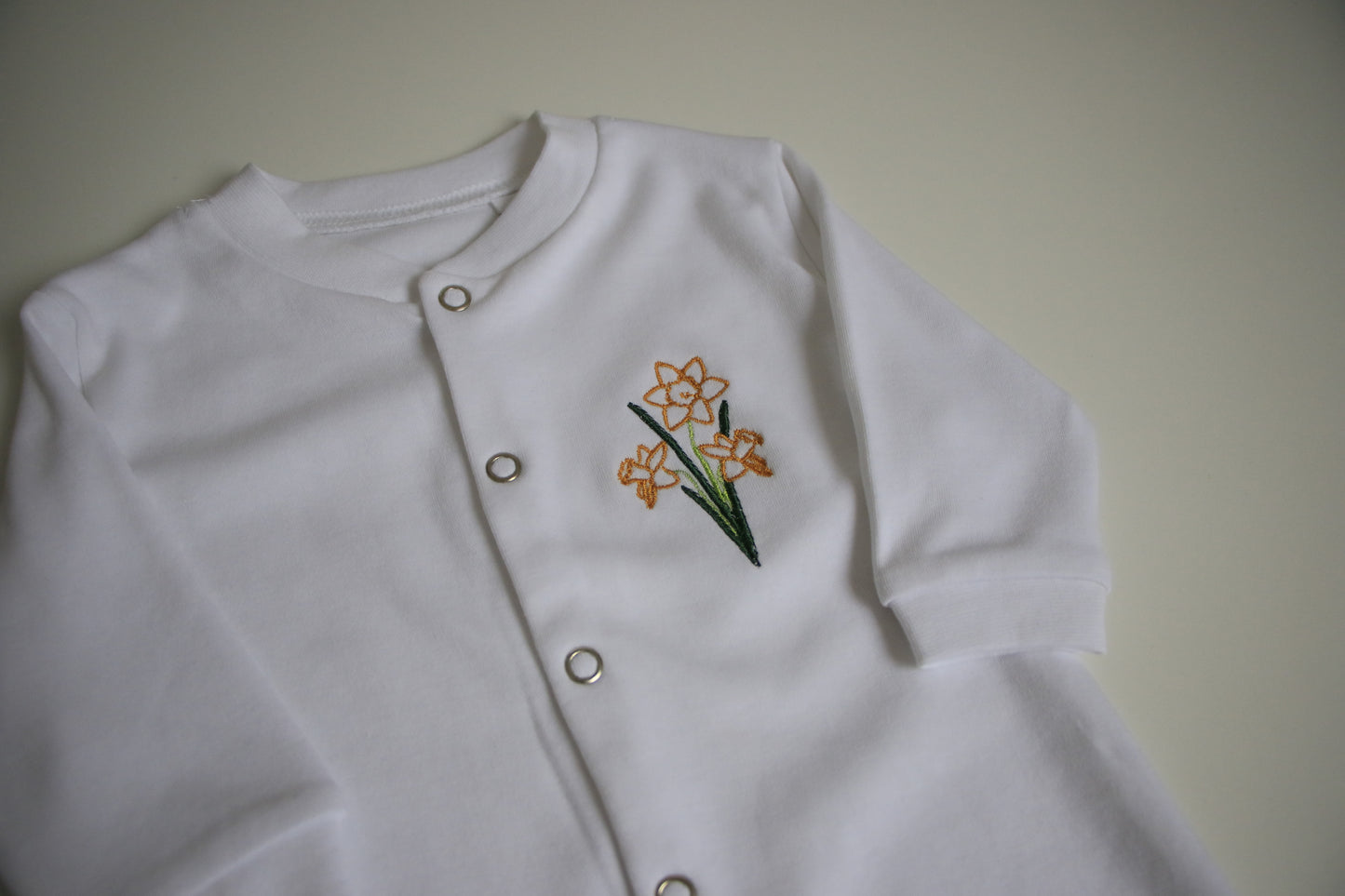 Newborn Daffodil Babygrow